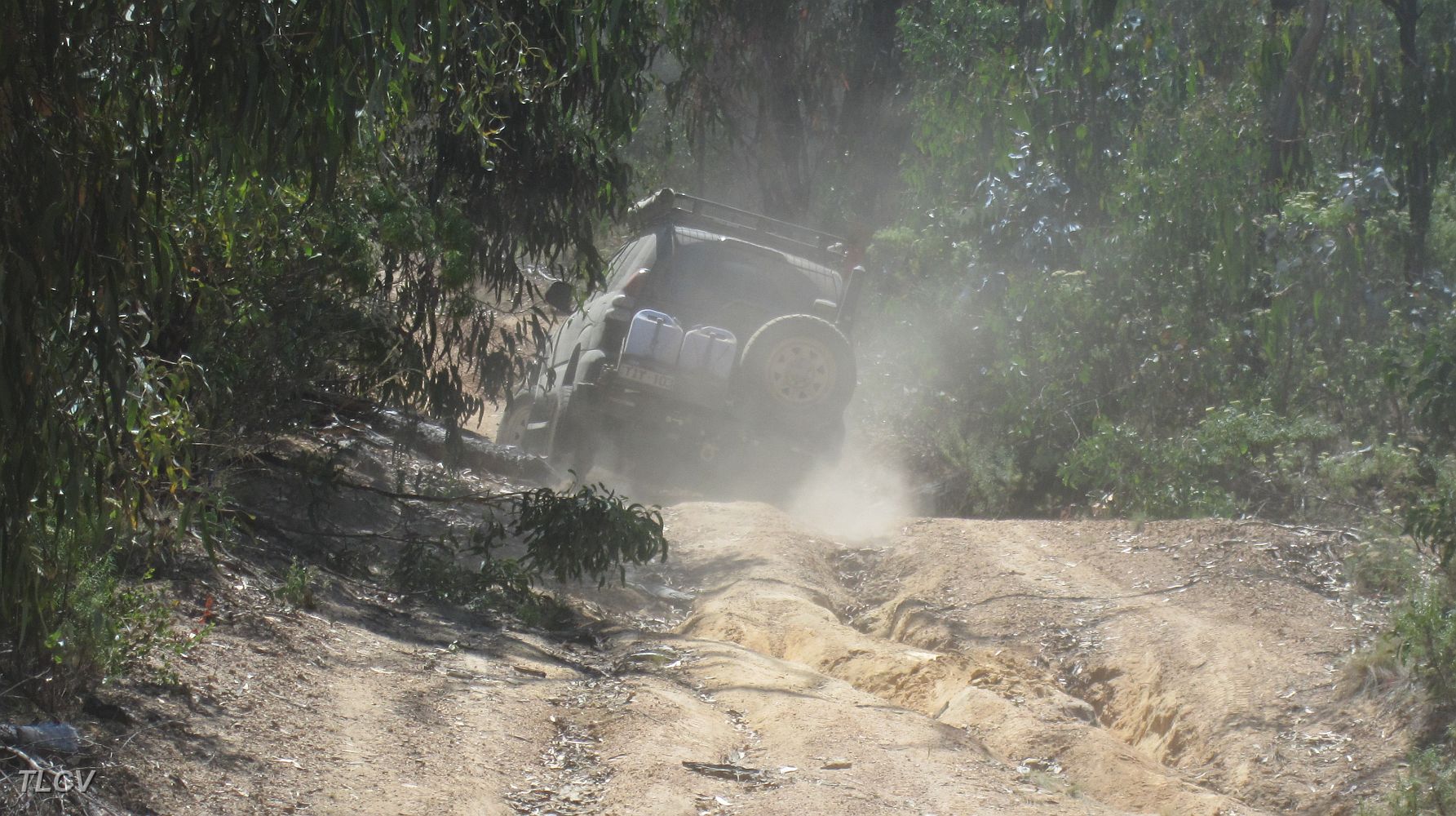 28-Panda creates dust after negotiating some bad ruts on Mt Stawell Track.JPG